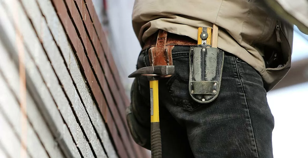 Tradesman working with professional tools